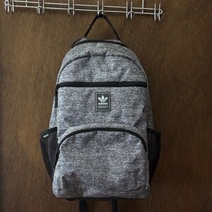 Adidas Black and Gray backpack some surface dirt but otherwise great condition